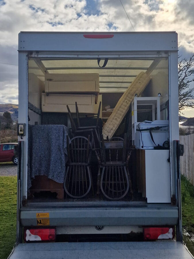 Back of G & D Electrical Services Ltd removal van, illustrating their expert removal services in Insch AB52 6HG, providing dependable logistics and transport for a variety of items throughout Aberdeenshire.