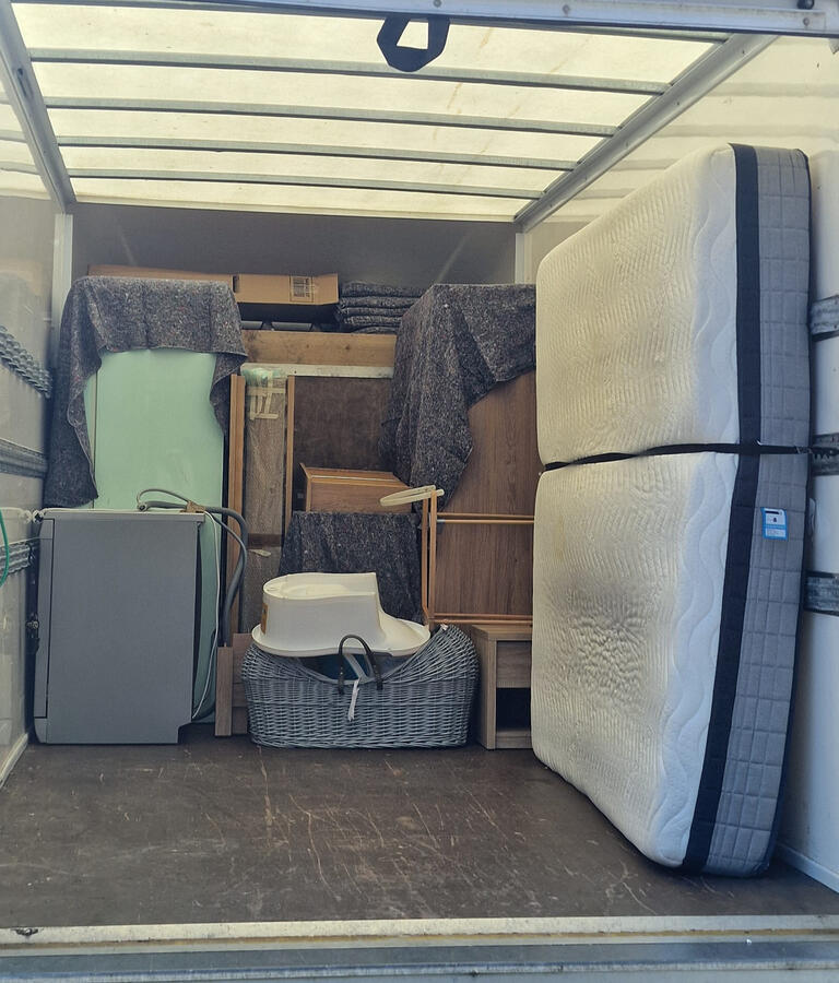 Back of G & D Electrical Services Ltd removal van, highlighting their professional moving services in Insch AB52 6HG, ensuring safe and efficient transport of household and office items.