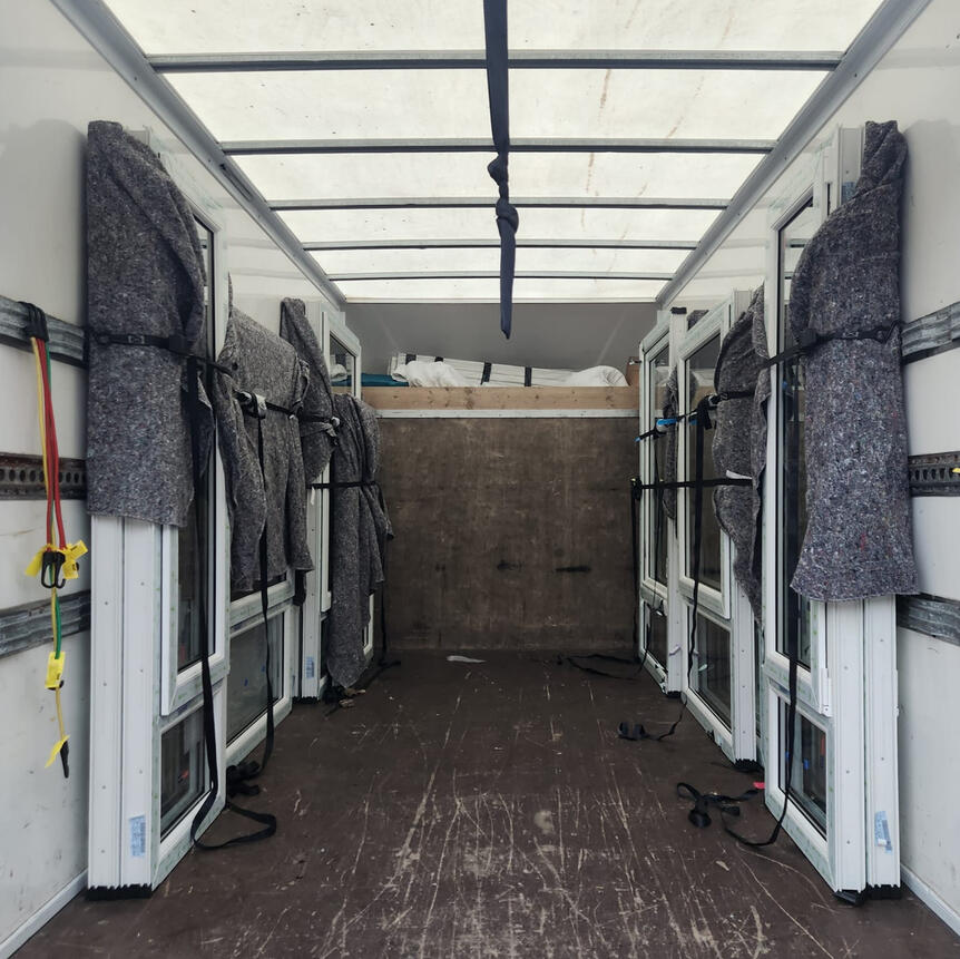 Back of a truck used by G & D Electrical Services Ltd for collection and delivery services in Insch AB52 6HG, providing dependable logistics and transport solutions across Aberdeenshire.